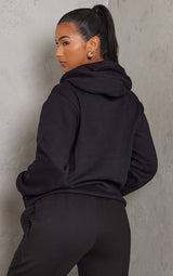 PRETTYLITTLETHING Logo Oversized duks sa crnim bedžom