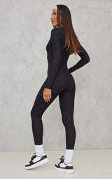 Jumpsuit me qafë të gjatë me mëngë të gjata të zeza